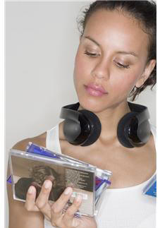 CDs,decisions,entertainment,faces,headphones,music,people,technology,teenagers,women